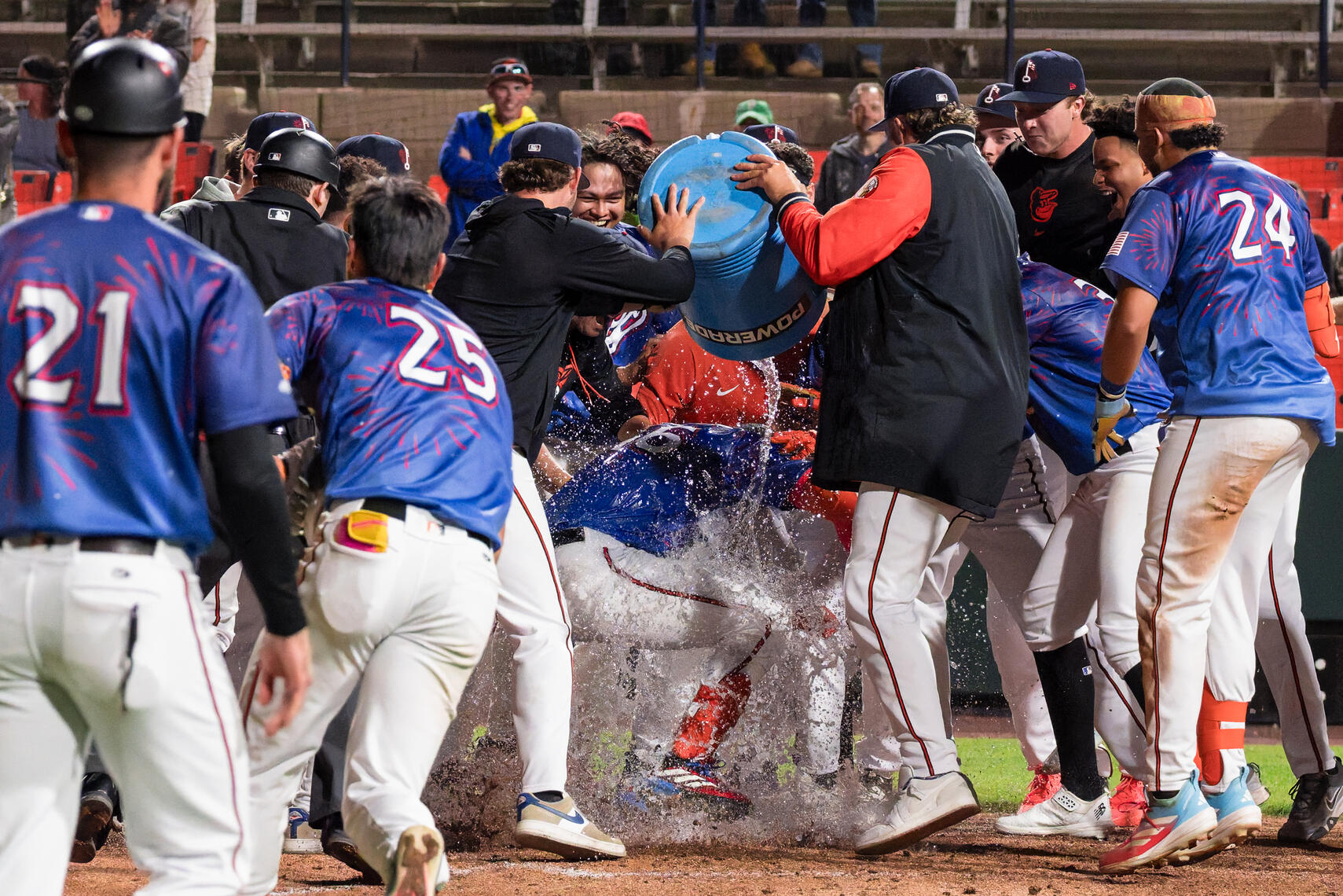 FREDERICK, MD - Frederick Keys players douse a teammate with a cooler while celebrating their May 8, 2026 victory over the Jersey Shore BlueClaws at Nymeo Field in Frederick, Maryland.
