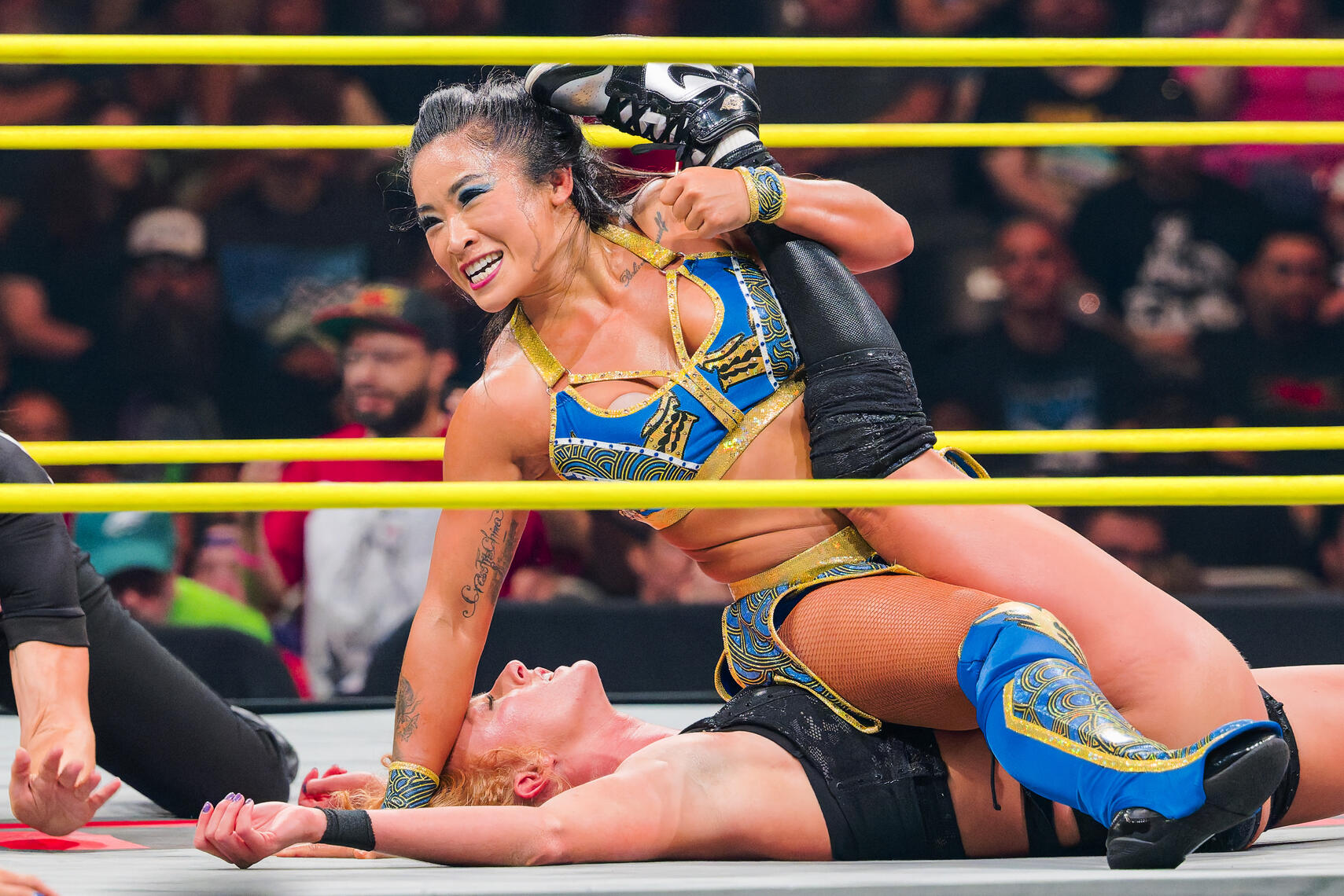 BALTIMORE, MD - Lei Ying Lee pins Maggie Lee during the August 16, 2025 TNA Impact event at Chesapeake Employers Insurance Arena in Baltimore, Maryland.