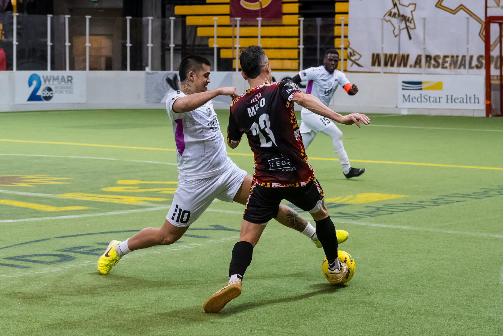 BALTIMORE, MD – Empire Strykers forward Franck Tayou (10) challenges for the ball against Baltimore Blast defender Jonatas Melo (23) during a Major Arena Soccer League match on February 1, 2026, at SECU Arena.
