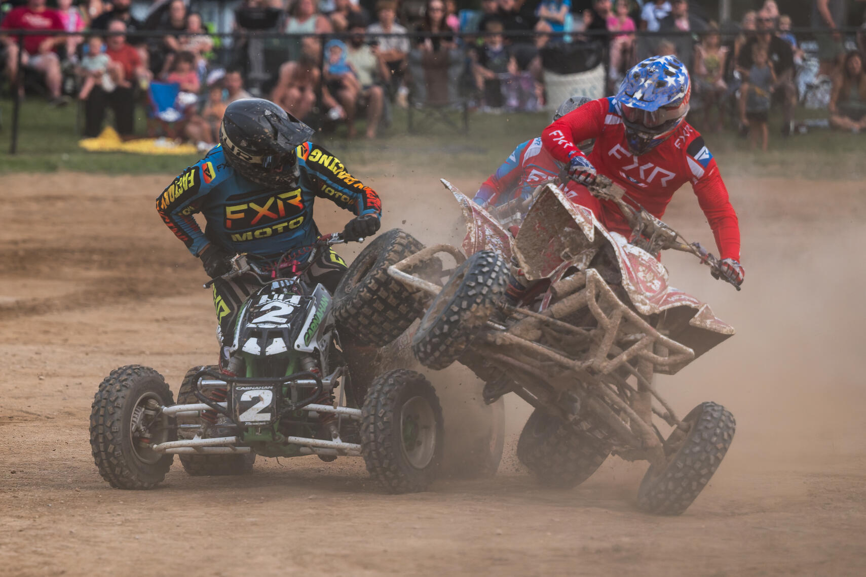 WESTMINSTER, MD – An Quad rider strikes another during a race at the Monster Truck Roundup on July 11, 2026, at the Carroll County AG Center.