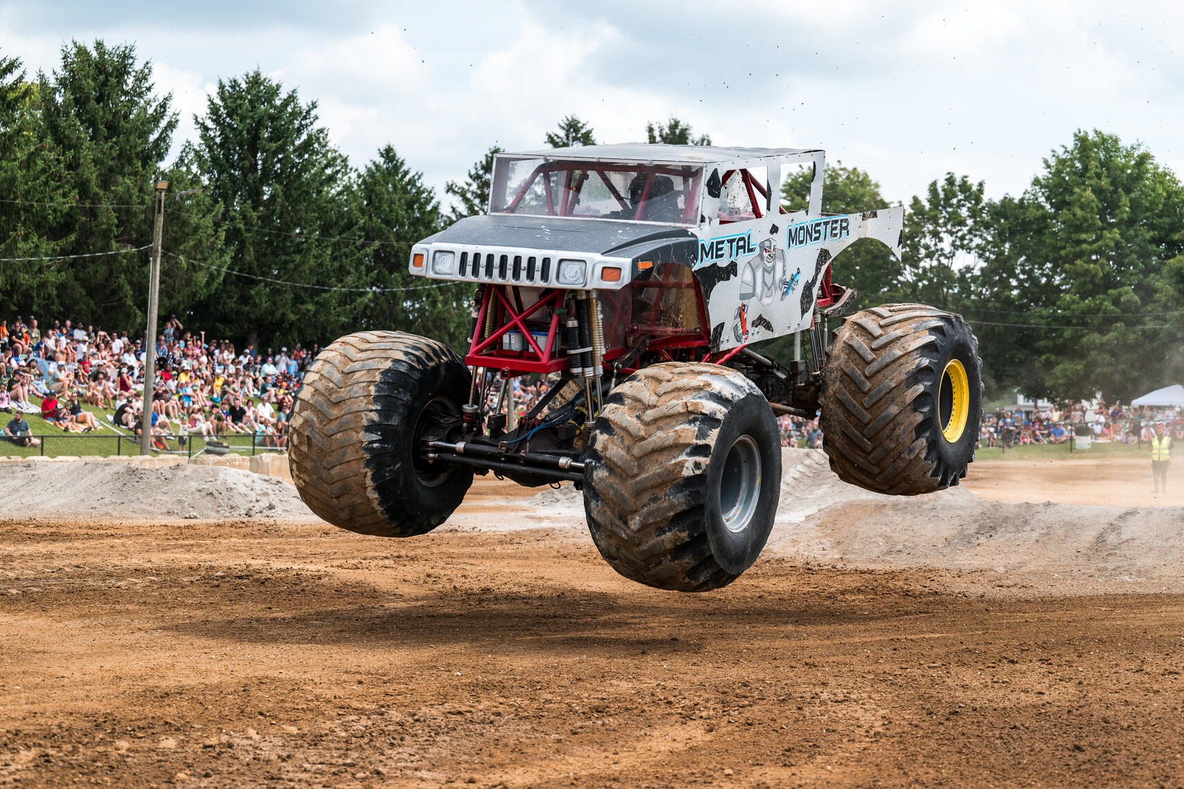 WESTMINSTER, MD - Metal Monster descends from a jump during the July 11, 2026 monster truck event at the Carroll County AG Center in Westminster, Maryland.