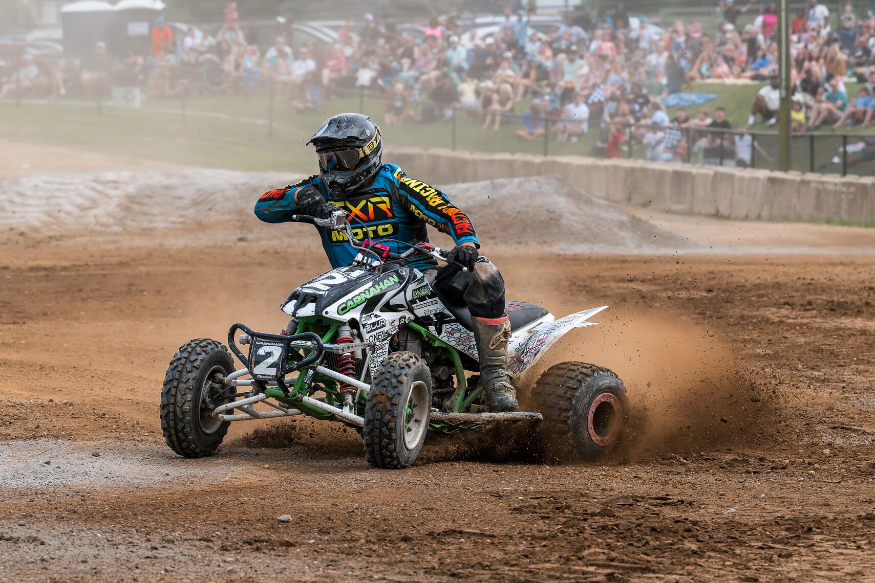 WESTMINSTER, MD - A rider navigates a dirt turn during the July 11, 2026 quad race at the Carroll County AG Center in Westminster, Maryland, contributing to the fast‑paced action between MD Quads and PA Quads throughout the program.